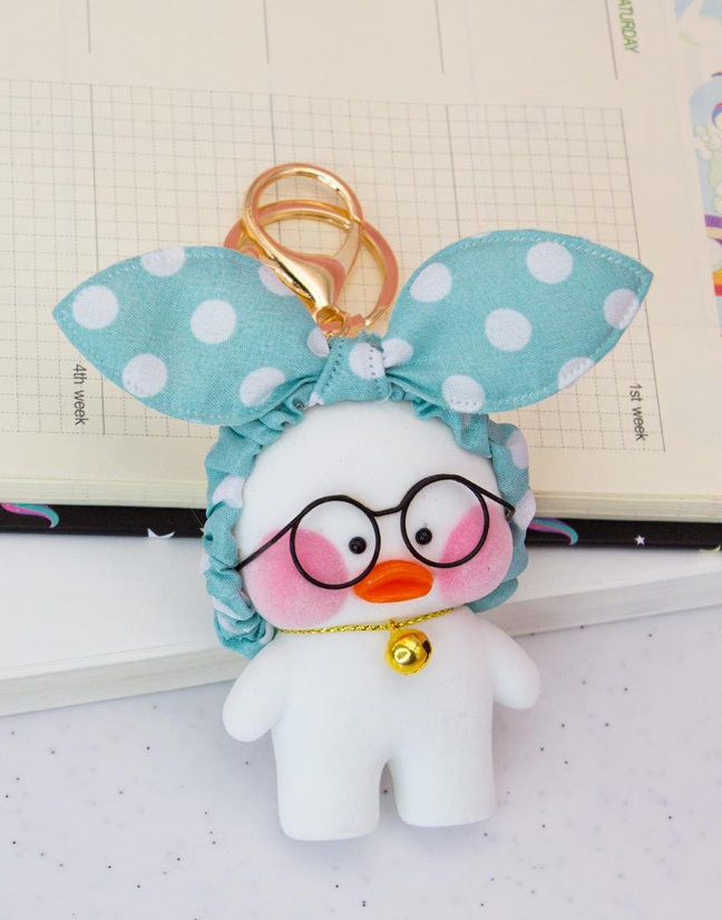 

Брелок Lalafanfan Duck (бирюзовый бант в горошек / белая) (8 см)