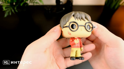  Funko POP: Harry Potter Anniversary  Harry Potter With The Stone (9,5 )